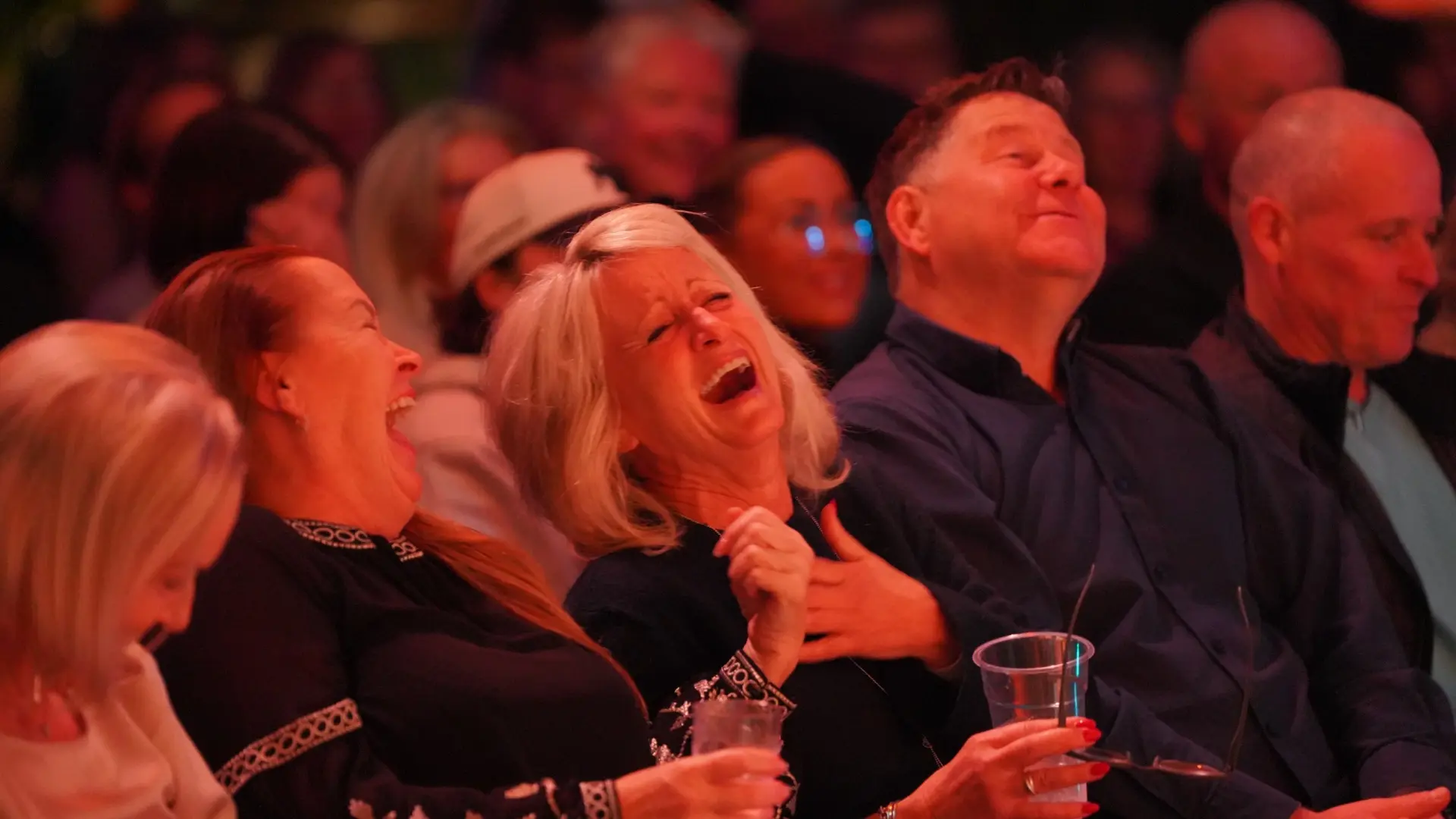 Audience enjoying comedy at H@ME & EAT